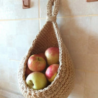 "Rustic Jute Woven Hanging Fruit and Vegetable Basket - Stylish Wall-Mounted Storage Solution for Kitchen and Table"