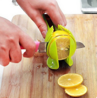 Fruit & Veggie Cutting Holder-slicer simply cut- eco-friendly